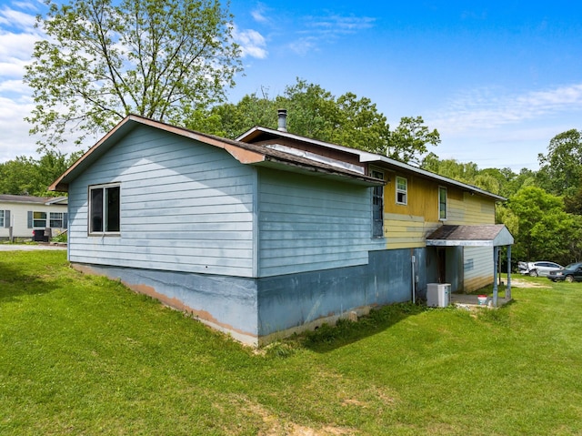 210 Welch Rd, Tazewell, TN 37879 - view of home's exterior with a yard