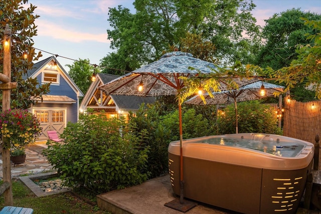 207 Main St E, Wartrace, TN 37183 - yard at dusk featuring a hot tub