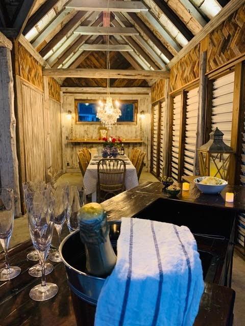 207 Main St E, Wartrace, TN 37183 - wine area with a chandelier and wooden walls