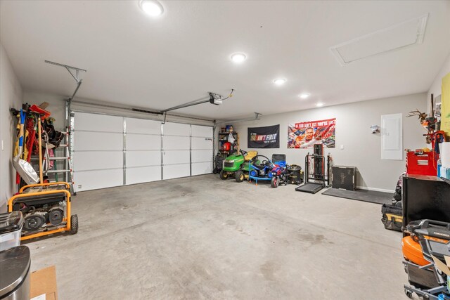 439 Ferry Bend Trl, Crossville, TN 38571 - garage with a garage door opener, recessed lighting, and electric panel