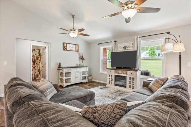 439 Ferry Bend Trl, Crossville, TN 38571 - living room with ceiling fan, wood finished floors, baseboards, and lofted ceiling