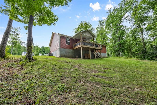 439 Ferry Bend Trl, Crossville, TN 38571 - back of property featuring a ceiling fan, stairs, a lawn, and a wooden deck