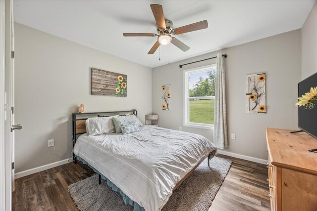 439 Ferry Bend Trl, Crossville, TN 38571 - bedroom featuring wood finished floors, baseboards, and a ceiling fan