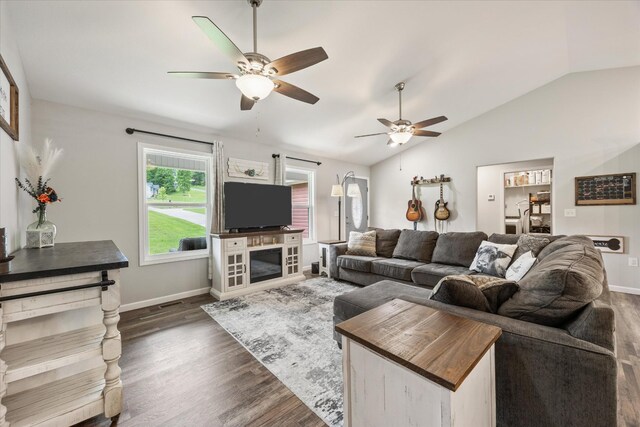 439 Ferry Bend Trl, Crossville, TN 38571 - living area with ceiling fan, lofted ceiling, dark wood-type flooring, and baseboards