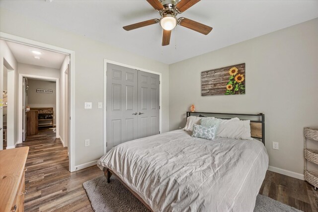 439 Ferry Bend Trl, Crossville, TN 38571 - bedroom featuring wood finished floors, baseboards, a closet, and a ceiling fan