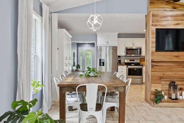 123 Hubbard St, Hohenwald, TN 38462 - dining space with lofted ceiling