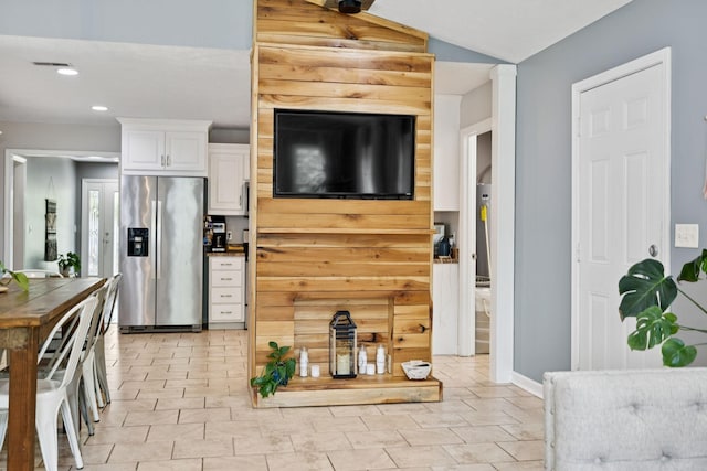 123 Hubbard St, Hohenwald, TN 38462 - kitchen with stainless steel fridge, recessed lighting, white cabinetry, and baseboards