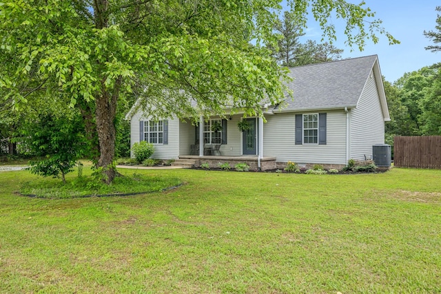 123 Hubbard St, Hohenwald, TN 38462 - view of front facade featuring covered porch, roof with shingles, and central AC