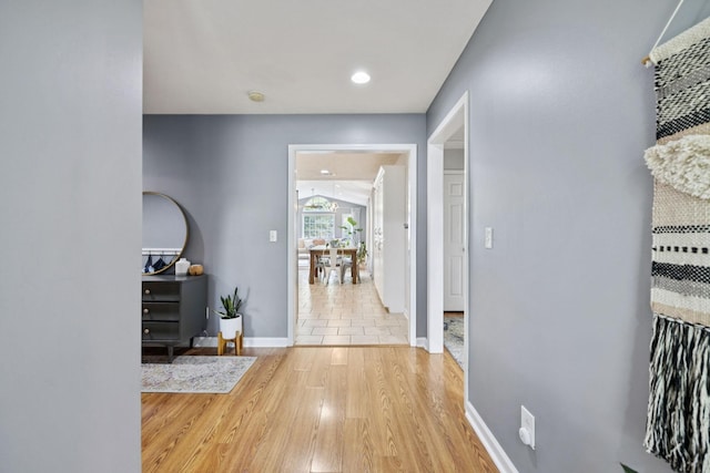 123 Hubbard St, Hohenwald, TN 38462 - corridor with wood finished floors, baseboards, and recessed lighting