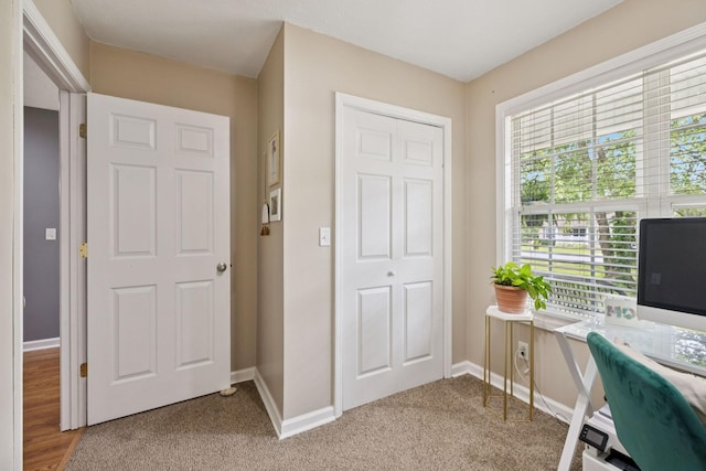 123 Hubbard St, Hohenwald, TN 38462 - office area featuring baseboards and light carpet
