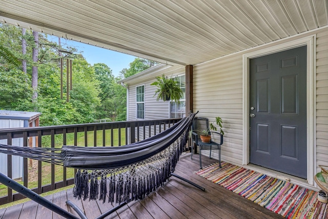 123 Hubbard St, Hohenwald, TN 38462 - wooden terrace featuring an outdoor structure