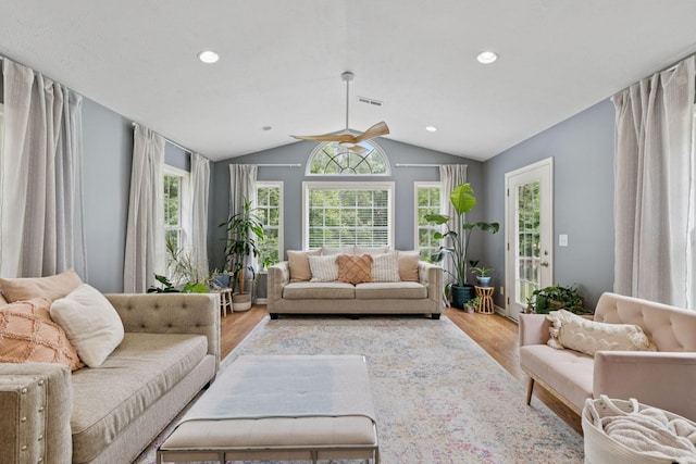 123 Hubbard St, Hohenwald, TN 38462 - living area with wood finished floors, vaulted ceiling, plenty of natural light, ceiling fan, and recessed lighting