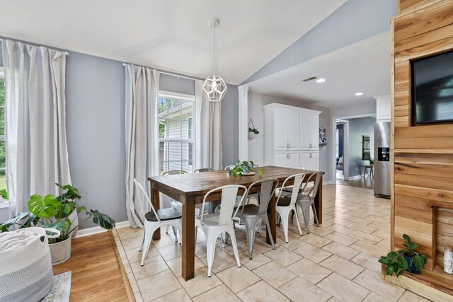 123 Hubbard St, Hohenwald, TN 38462 - dining area with lofted ceiling, baseboards, and recessed lighting