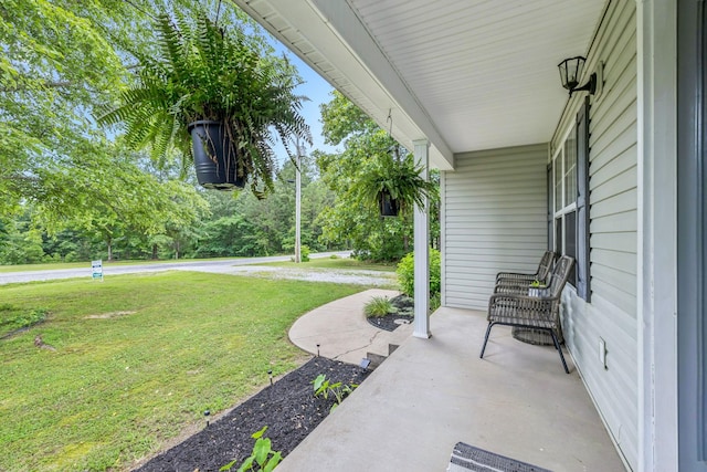 123 Hubbard St, Hohenwald, TN 38462 - porch featuring a lawn