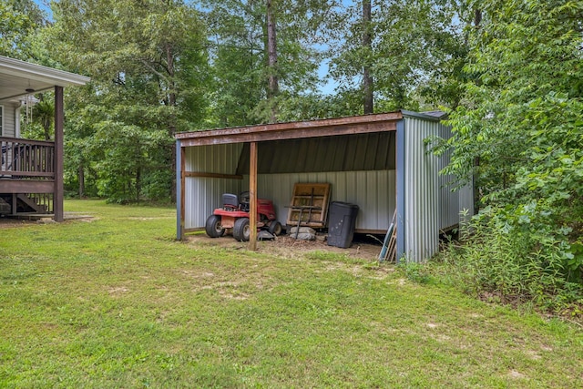 123 Hubbard St, Hohenwald, TN 38462 - view of pole building featuring a yard and a detached carport