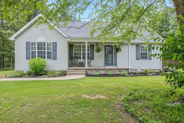 123 Hubbard St, Hohenwald, TN 38462 - ranch-style home featuring a porch, a front lawn, and a shingled roof