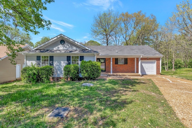 1121 Traceton Cir, Antioch, TN 37013 - ranch-style home with an attached garage, a front yard, concrete driveway, and brick siding