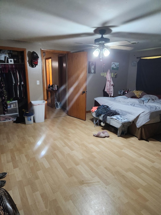303 Shady Ln, Lawrenceburg, TN 38464 - bedroom with wood finished floors, a closet, and ceiling fan