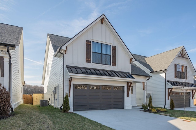 1321 Island View Ct, Nashville, TN 37214 - modern farmhouse with board and batten siding, central air condition unit, an attached garage, driveway, and a standing seam roof