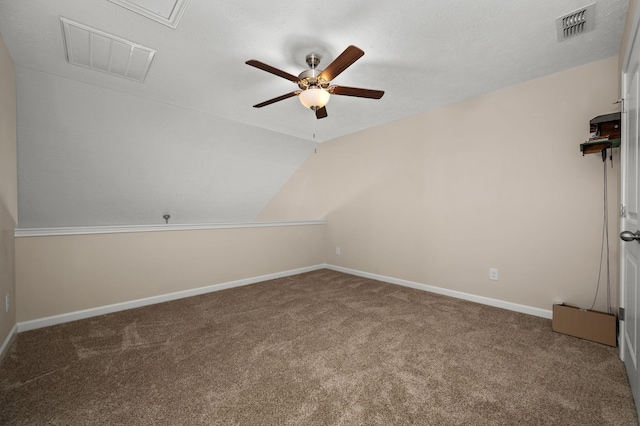 4713 Pompano Ln, Murfreesboro, TN 37128 - carpeted spare room featuring ceiling fan, vaulted ceiling, and attic access