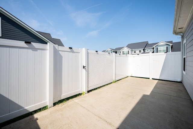 4713 Pompano Ln, Murfreesboro, TN 37128 - fenced backyard featuring a patio and a residential view