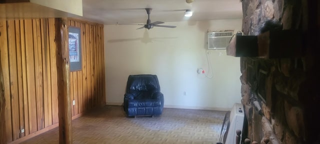 241 Peterson Loop, Holladay, TN 38341 - unfurnished room with a ceiling fan, baseboards, and a wall mounted air conditioner