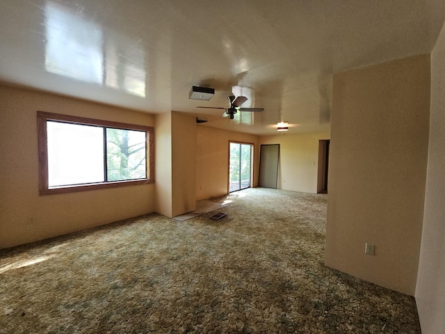 241 Peterson Loop, Holladay, TN 38341 - carpeted spare room featuring plenty of natural light and a ceiling fan