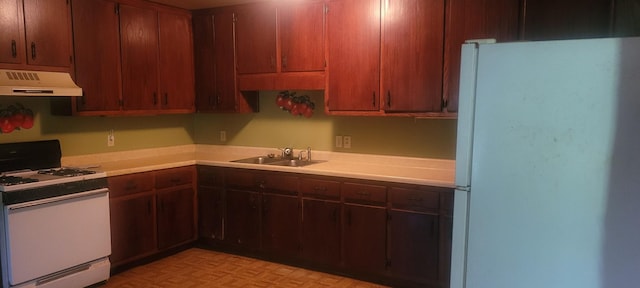 241 Peterson Loop, Holladay, TN 38341 - kitchen with white appliances, custom exhaust hood, and light countertops