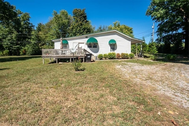 5116 Jim Cummings Hwy, Woodbury, TN 37190 - view of front of house with a front lawn, a deck, and dirt driveway