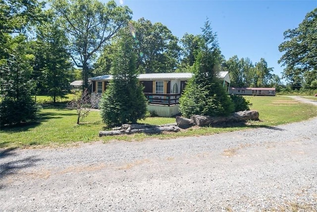 5116 Jim Cummings Hwy, Woodbury, TN 37190 - view of front of home featuring a front yard and metal roof