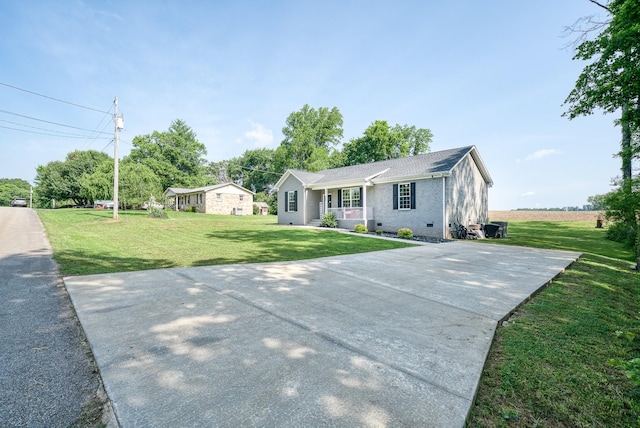 425 Royal Dr, Rock Island, TN 38581 - ranch-style house with a front lawn, concrete driveway, covered porch, and crawl space