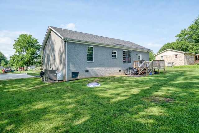 425 Royal Dr, Rock Island, TN 38581 - rear view of house with crawl space, a deck, a yard, and central air condition unit