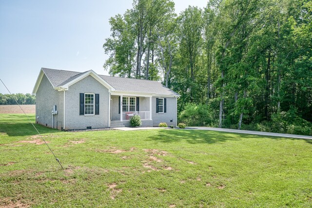 425 Royal Dr, Rock Island, TN 38581 - ranch-style house with covered porch and a front yard
