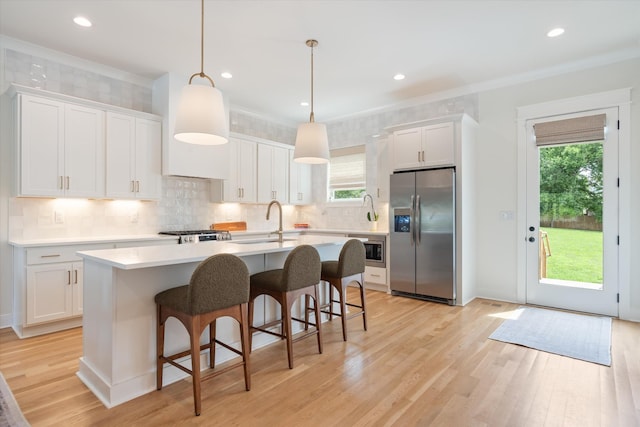 2123 Scott Ave Unit A, Nashville, TN 37216 - kitchen with appliances with stainless steel finishes, a sink, healthy amount of natural light, light wood-type flooring, and recessed lighting