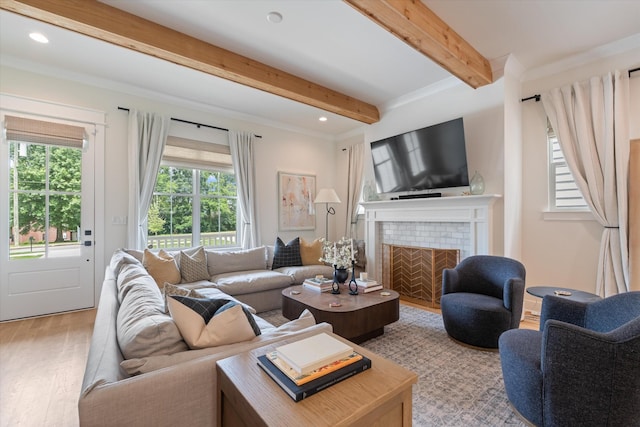2123 Scott Ave Unit A, Nashville, TN 37216 - living area featuring wood finished floors, beamed ceiling, recessed lighting, a brick fireplace, and ornamental molding