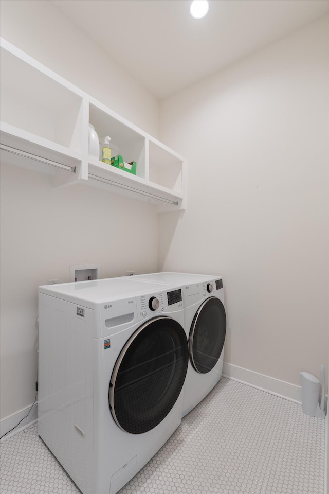 2123 Scott Ave Unit A, Nashville, TN 37216 - laundry area featuring washer and clothes dryer and baseboards