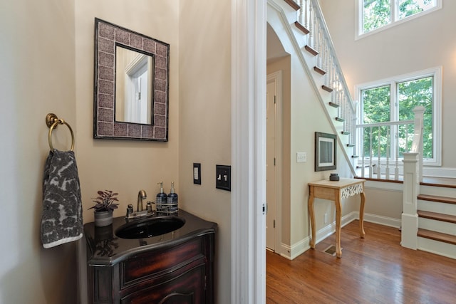 2754 Broyles Ln, Franklin, TN 37069 - bathroom with healthy amount of natural light, wood finished floors, vanity, and baseboards
