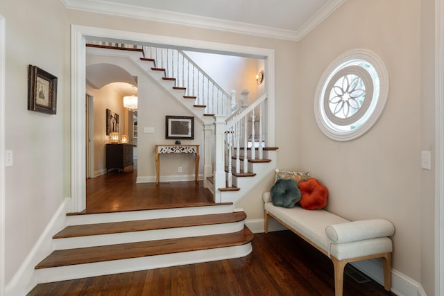 2754 Broyles Ln, Franklin, TN 37069 - stairs with wood finished floors, crown molding, arched walkways, and baseboards