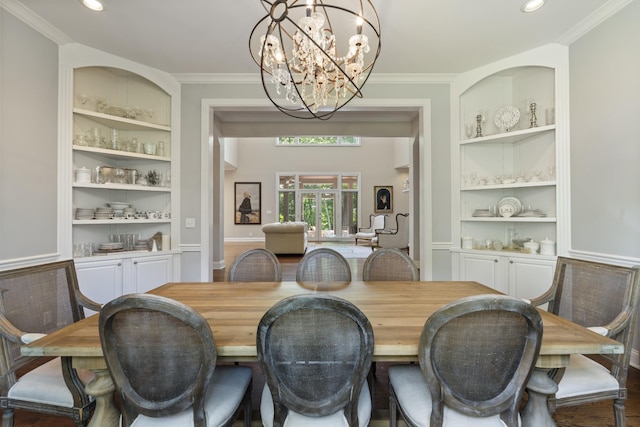 2754 Broyles Ln, Franklin, TN 37069 - dining area with built in shelves, a chandelier, crown molding, and recessed lighting