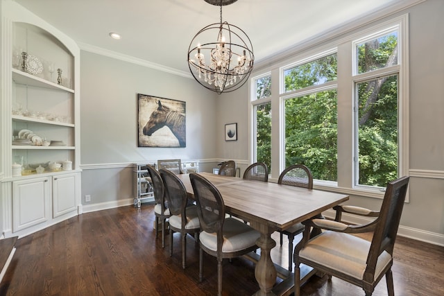 2754 Broyles Ln, Franklin, TN 37069 - dining space with a chandelier, crown molding, built in shelves, dark wood finished floors, and baseboards