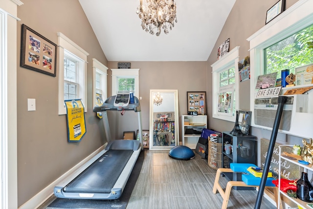 2754 Broyles Ln, Franklin, TN 37069 - workout room with vaulted ceiling, a chandelier, and baseboards