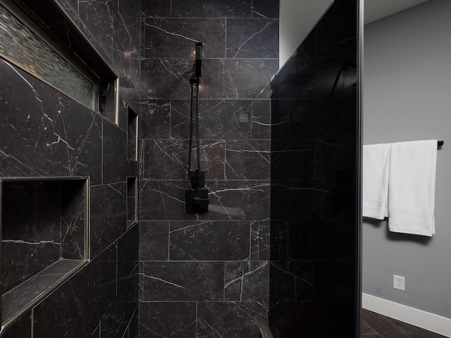 1288 Rogues Fork Rd, Bethpage, TN 37022 - bathroom with tiled shower and baseboards