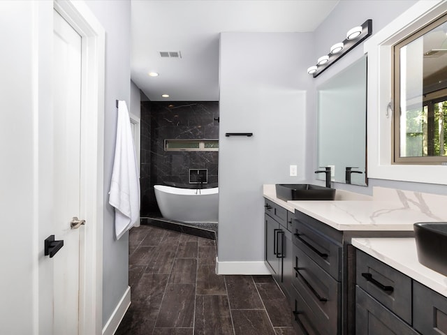 1288 Rogues Fork Rd, Bethpage, TN 37022 - bathroom featuring vanity, a soaking tub, and recessed lighting
