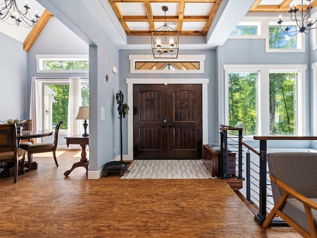 1288 Rogues Fork Rd, Bethpage, TN 37022 - entrance foyer with a chandelier, wood finished floors, plenty of natural light, a towering ceiling, and beam ceiling