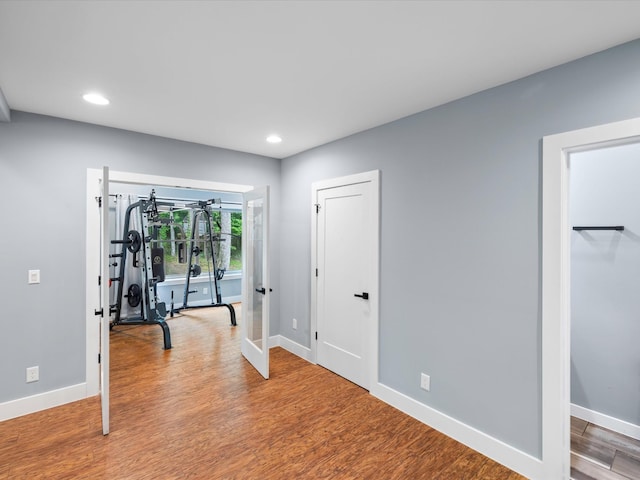 1288 Rogues Fork Rd, Bethpage, TN 37022 - workout room featuring recessed lighting, light wood finished floors, and french doors
