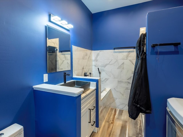 1288 Rogues Fork Rd, Bethpage, TN 37022 - full bath with vanity, wood finished floors, and a shower