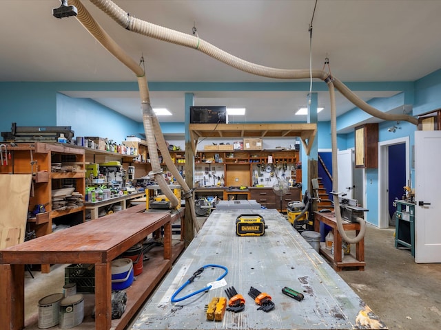 1288 Rogues Fork Rd, Bethpage, TN 37022 - dining room featuring a workshop area and concrete flooring