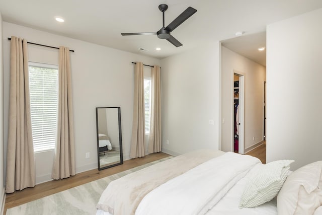 408D Moore Ave, Nashville, TN 37203 - bedroom with light wood-style floors, recessed lighting, a spacious closet, ceiling fan, and baseboards