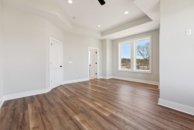 107 E 9th St Unit C5, Columbia, TN 38401 - unfurnished room with wood finished floors, a raised ceiling, recessed lighting, baseboards, and ceiling fan