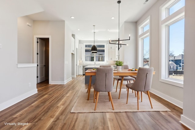107 E 9th St Unit C5, Columbia, TN 38401 - dining area with wood finished floors, baseboards, a chandelier, and recessed lighting